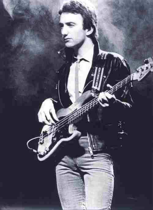 amongst the smoke emerges...John Deacon!! Ahh!